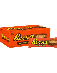 REESE'S Peanut Butter Cups – Coppette di cioccolato al latte con cremoso burro d’arachidi.